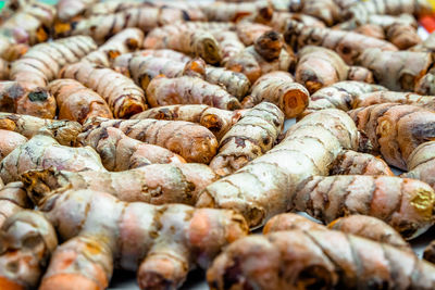 Full frame shot of onions for sale at market stall