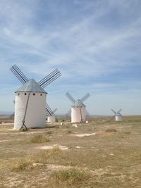 Windmills on field