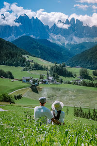 Scenic view of landscape and mountains against sky