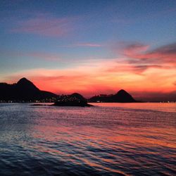 Scenic view of sea against sky at sunset