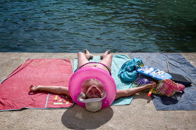 High angle view portrait of girl in water