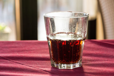 Close-up of beer in glass on table