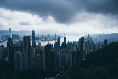 Panoramic view of modern buildings in city against sky