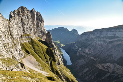 Scenic view of rocky mountains against sky