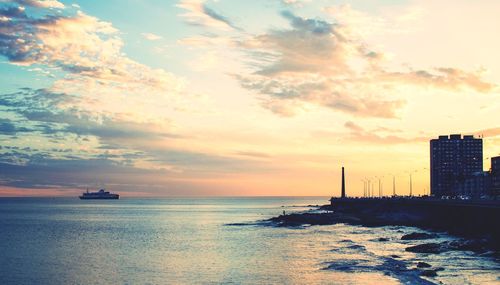 Scenic view of sea against sky during sunset