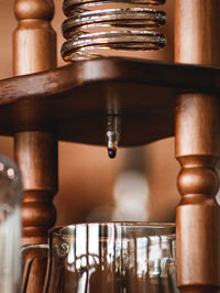 Coffee shop tool close up - yama cold drip water with coffee inside. coffee wallpaper dripping. 