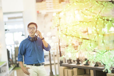 Full length of young man standing outdoors