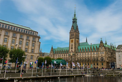 View of buildings against cloudy sky