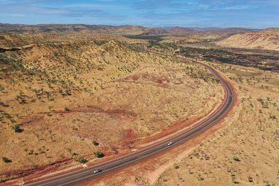 High angle view of road amidst landscape against sky