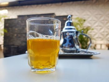 Close-up of beer in glass on table