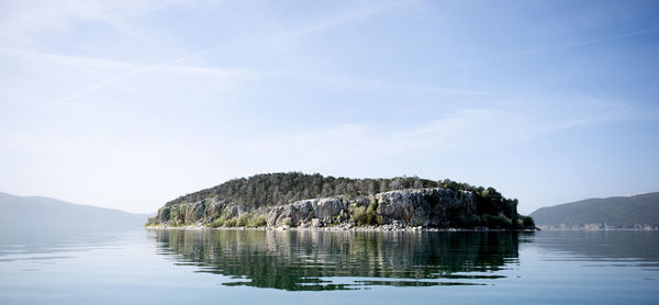 Scenic view of rock formation against sky