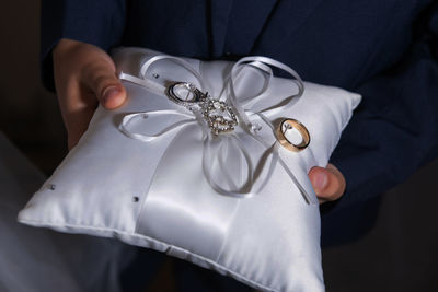 Close-up of woman holding hands