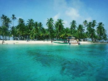 Scenic view of sea against blue sky