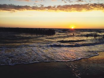 Scenic view of sea against dramatic sky