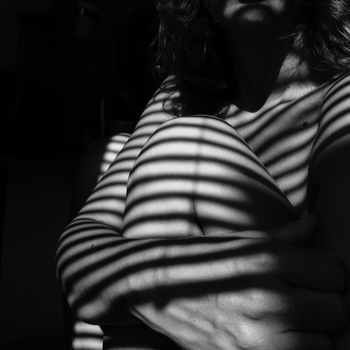 Striped shadow on woman