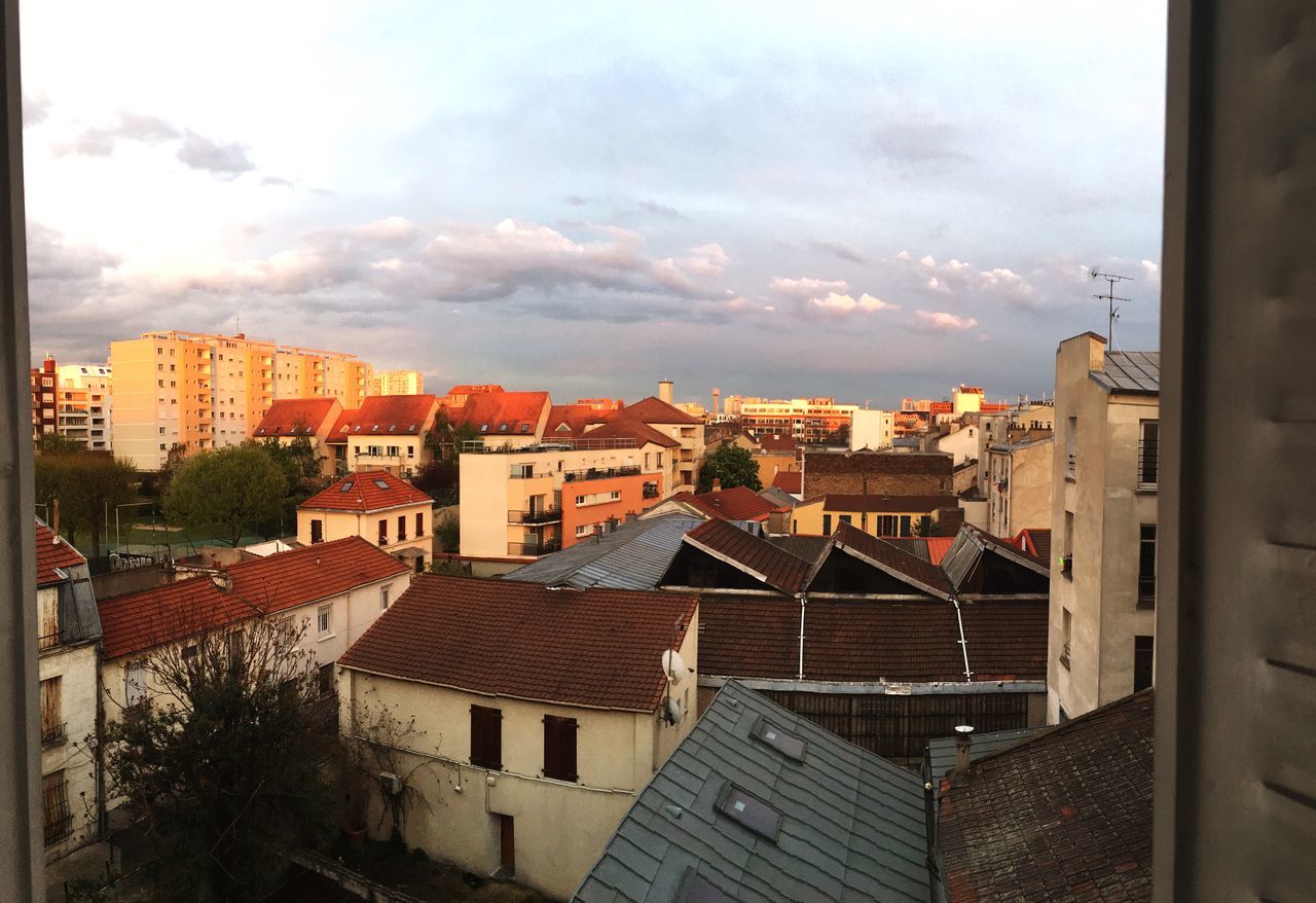 architecture, building exterior, built structure, cityscape, sky, residential district, city, residential structure, residential building, crowded, roof, cloud - sky, house, high angle view, town, cloudy, townscape, cloud, day, human settlement