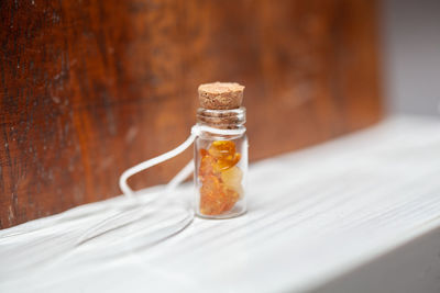 Close-up of glass of jar on table