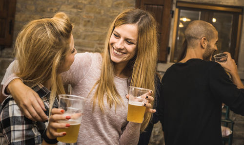 Group of people in drinking glass