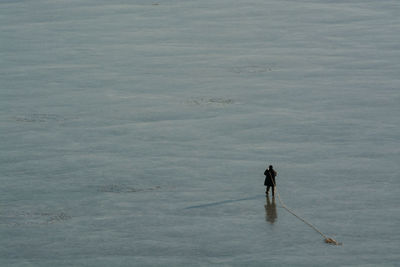 Full length of man fishing