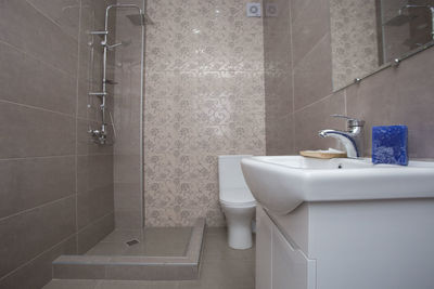 View of piano and keys in bathroom