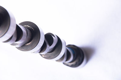 Close-up of camera over white background