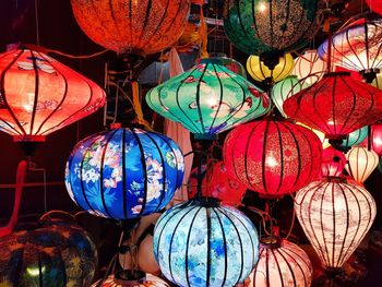 Multi colored lanterns hanging at market stall