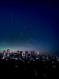 Illuminated cityscape at night