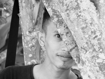 Portrait of young man looking away