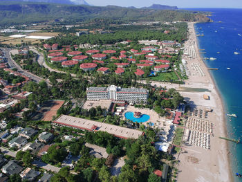 High angle view of buildings and sea in city