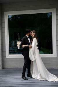 Rear view of couple standing in church