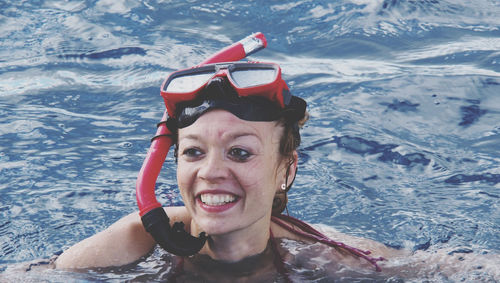 Smiling women snorkeling in the sea