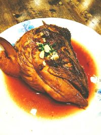 Close-up of served food in plate