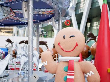 Close-up of gingerbread man at amusement park