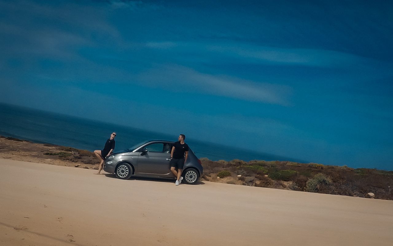 VINTAGE CAR ON BEACH