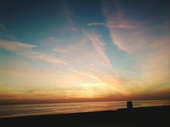 Scenic view of sea at sunset