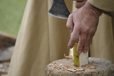 Close-up of man working on wood