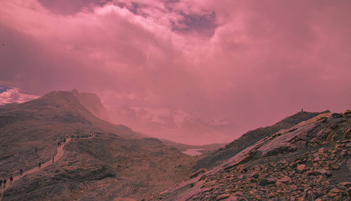 Scenic view of mountains against sky during sunset