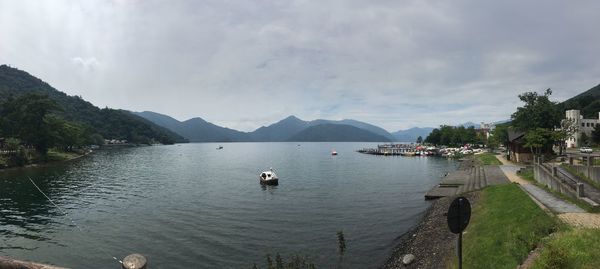 Scenic view of bay against sky