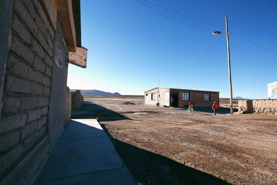 Houses against clear sky