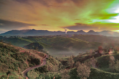 Panoramic view of landscape against sky during sunset