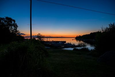 Scenic view of sea against sky at sunset