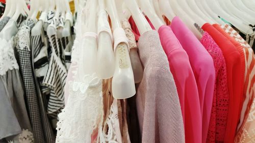 Close-up of clothes hanging on coathangers