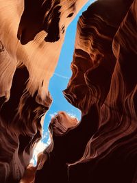 Low section of person standing on rock