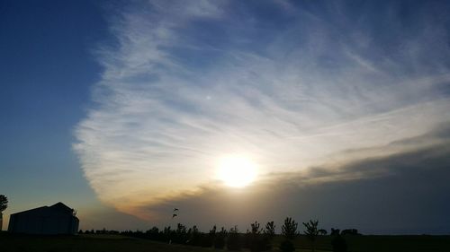 Scenic view of landscape at sunset