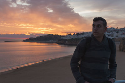 Scenic view of sea against sky at sunset