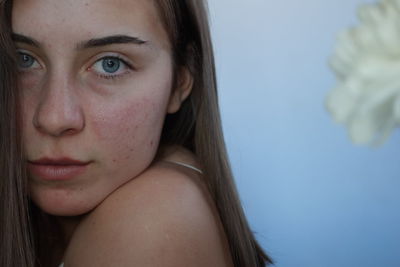 Close-up portrait of young woman