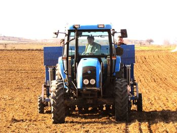 View of agricultural vehicle on field