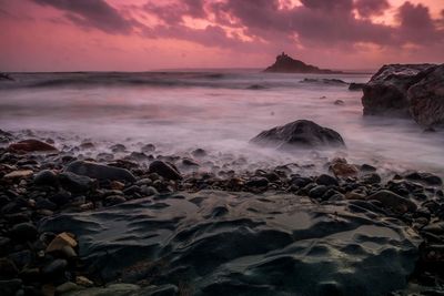 Scenic view of sea against sky during sunset