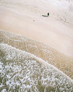 High angle view of sand at beach