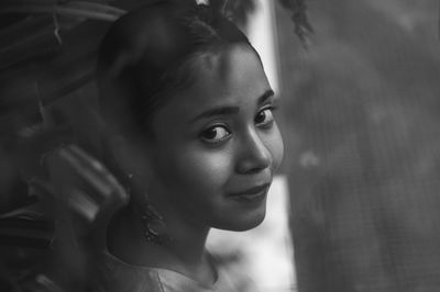 Close-up portrait of young woman 